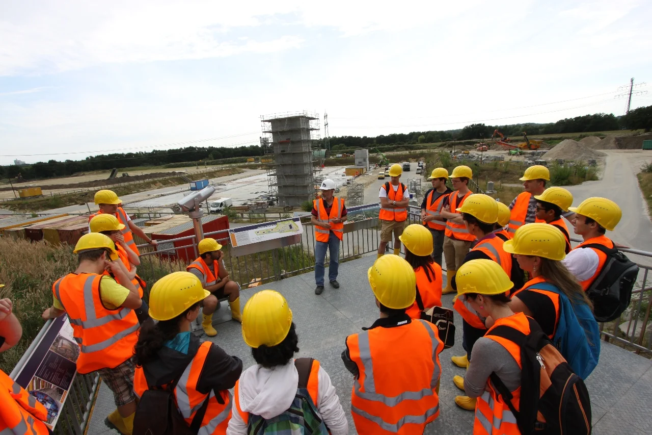 Group of contractors on foundations of building site